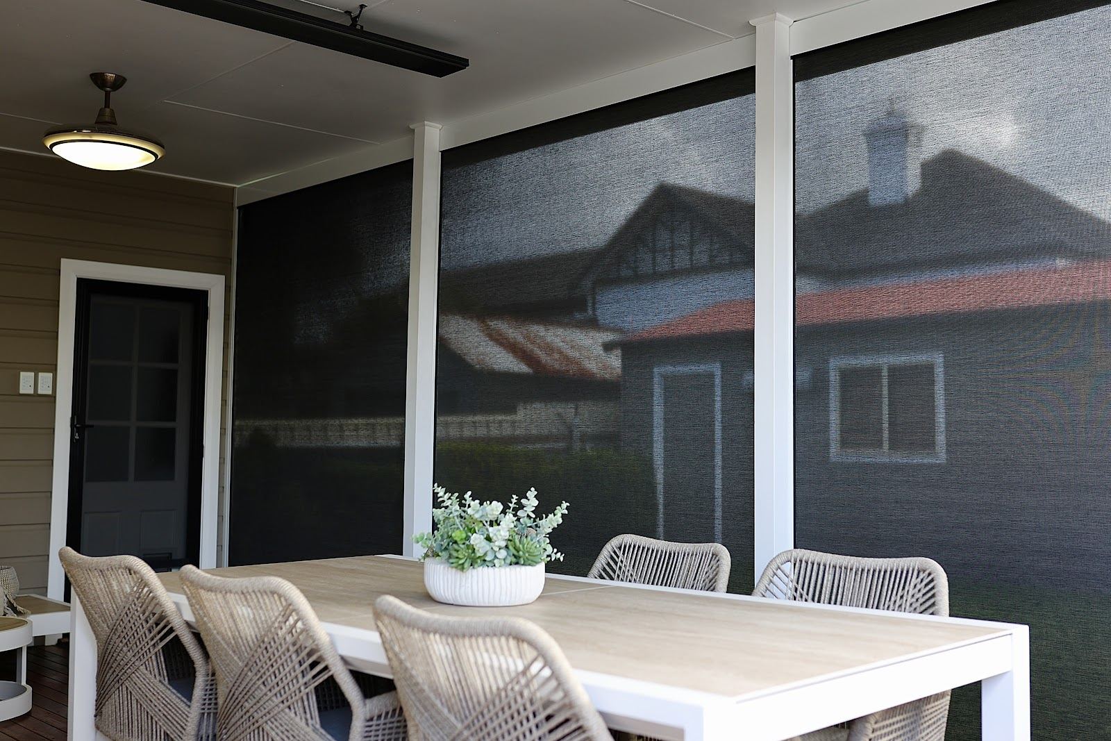 Remote controlled zip screens on a renovated rear deck